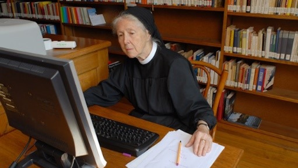 Silja Walter working at the computer in her study