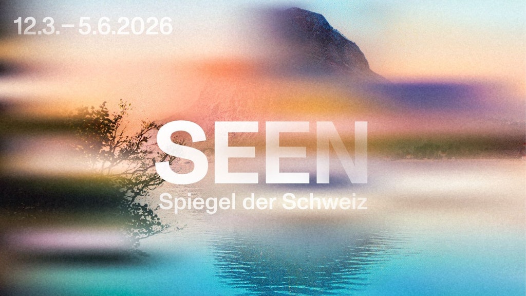 Ein unscharfer Hintergrund mit einem Berg, einem See und einer Stadt.